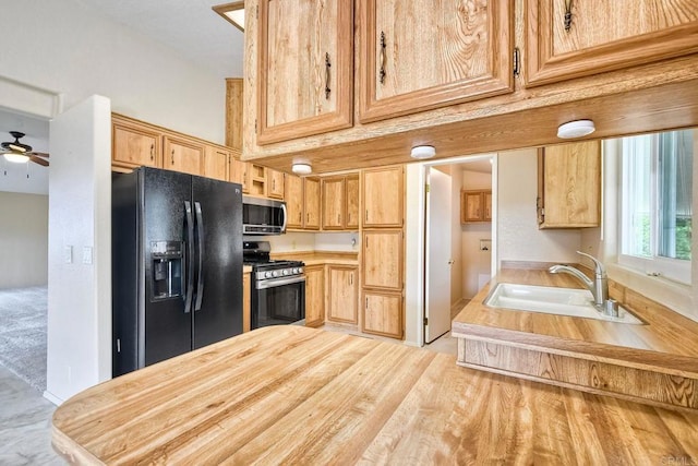 6496 Friendly Pl, Carlsbad, CA 92011 - kitchen with appliances with stainless steel finishes, a sink, light countertops, a ceiling fan, and light brown cabinetry