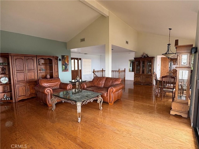 12070 Rideout Way, Whittier, CA 90601 - living room with light wood finished floors and high vaulted ceiling