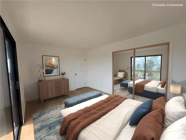 12070 Rideout Way, Whittier, CA 90601 - bedroom with light wood finished floors, baseboards, and radiator heating unit