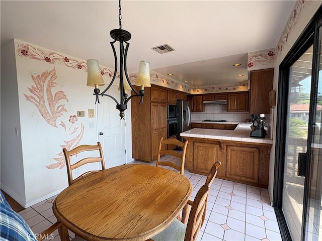 12070 Rideout Way, Whittier, CA 90601 - dining space featuring light tile patterned flooring, baseboards, and recessed lighting