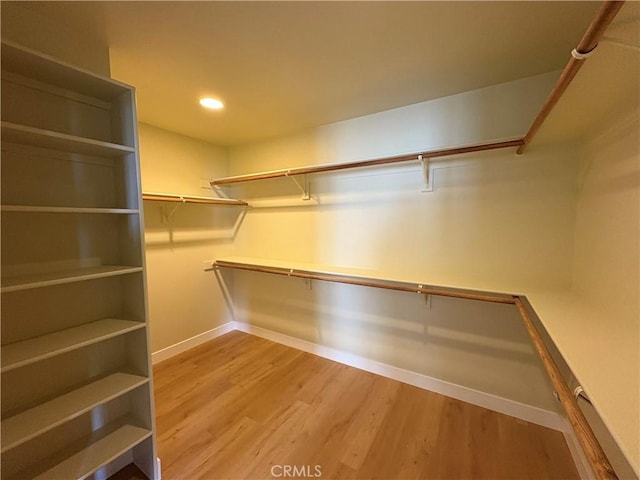 12070 Rideout Way, Whittier, CA 90601 - walk in closet featuring wood finished floors