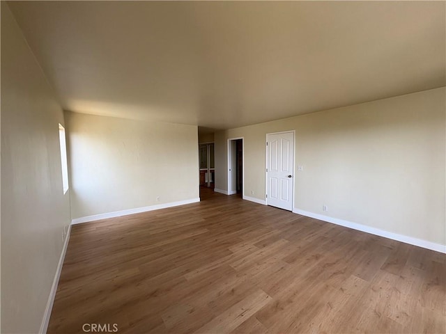 12070 Rideout Way, Whittier, CA 90601 - spare room with baseboards and wood finished floors