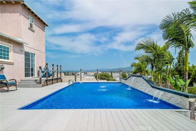 724 Forestview Ave, La Puente, CA 91746 - swimming pool featuring a wooden deck and a patio
