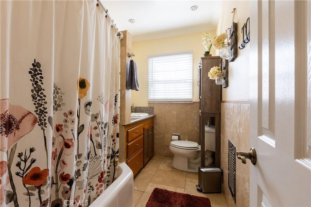 724 Forestview Ave, La Puente, CA 91746 - bathroom featuring toilet, tile walls, tile patterned floors, and vanity