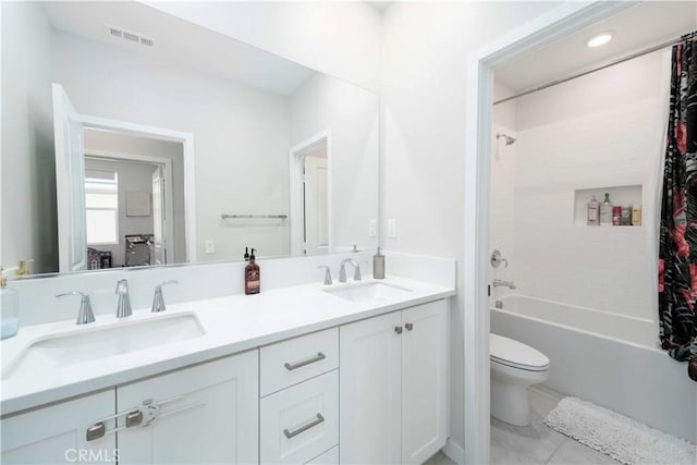 26956 Nature View Pl, Valencia, CA 91355 - full bath with double vanity, toilet, shower / tub combo with curtain, and tile patterned flooring