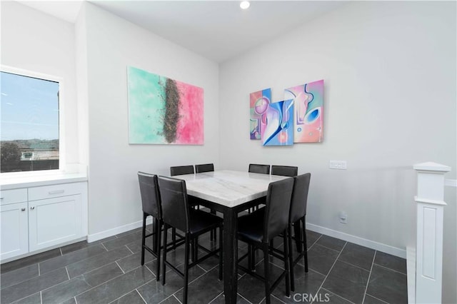 26956 Nature View Pl, Valencia, CA 91355 - dining area with baseboards, dark tile patterned flooring, and recessed lighting