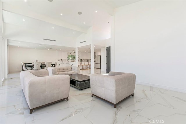 12410 Mclennan Ave, Granada Hills, CA 91344 - living area with light marble finish floors and recessed lighting
