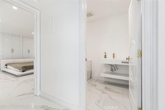 12410 Mclennan Ave, Granada Hills, CA 91344 - bathroom with marble tiled flooring and recessed lighting