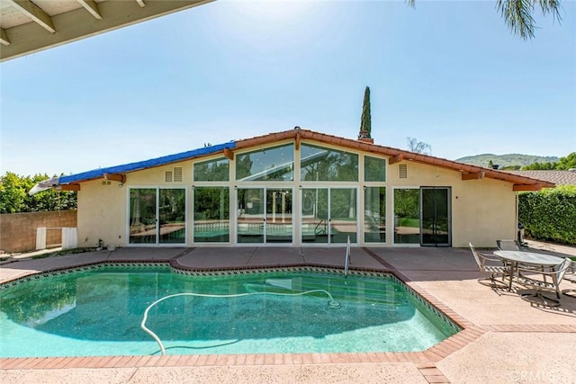 12410 Mclennan Ave, Granada Hills, CA 91344 - view of swimming pool with a patio area