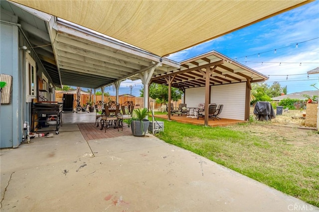 502 S Rosario Ave, San Jacinto, CA 92583 - view of patio / terrace with outdoor dining area, a deck, and area for grilling