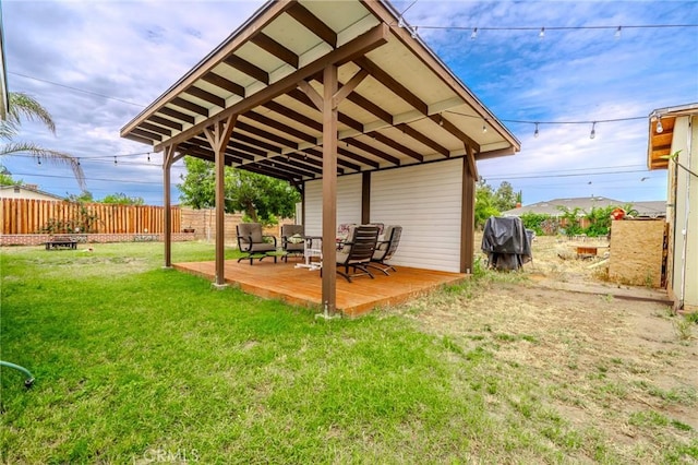 502 S Rosario Ave, San Jacinto, CA 92583 - view of yard featuring a deck