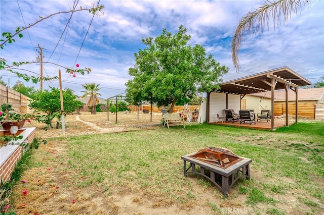 502 S Rosario Ave, San Jacinto, CA 92583 - view of yard featuring an outdoor fire pit
