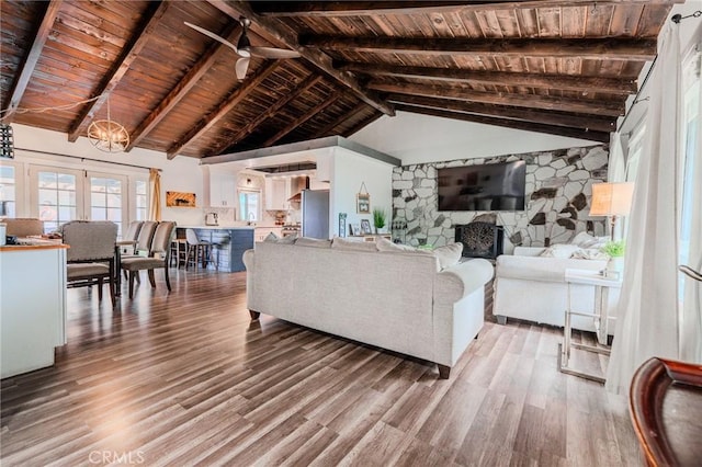 502 S Rosario Ave, San Jacinto, CA 92583 - living room with wood finished floors, wooden ceiling, a fireplace, and a chandelier