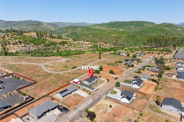 1863 Norwood Dr, Paradise, CA 95969 - aerial view of property and surrounding area with a mountain backdrop