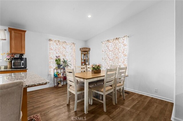 1863 Norwood Dr, Paradise, CA 95969 - dining area featuring dark wood finished floors, baseboards, lofted ceiling, and recessed lighting