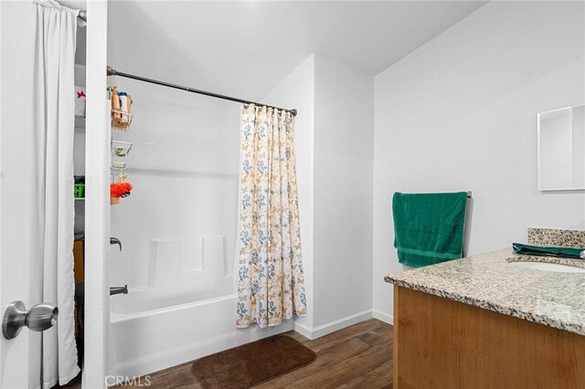 1863 Norwood Dr, Paradise, CA 95969 - full bath with vanity, wood finished floors, baseboards, and shower / tub combo