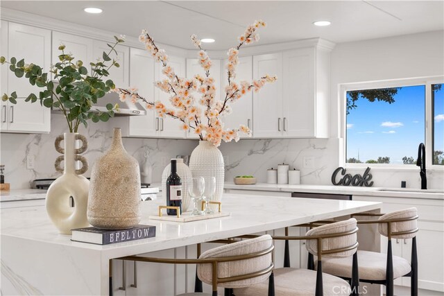 17585 Candela Dr, Rowland Heights, CA 91748 - kitchen with a sink, white cabinets, tasteful backsplash, and recessed lighting