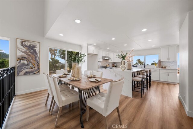 17585 Candela Dr, Rowland Heights, CA 91748 - dining room with recessed lighting, light wood-style floors, and baseboards