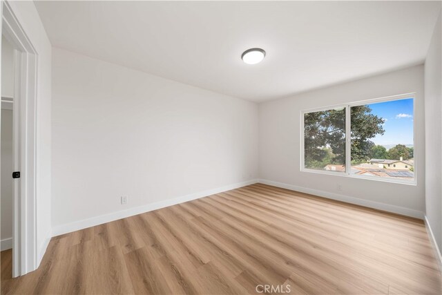 17585 Candela Dr, Rowland Heights, CA 91748 - unfurnished room with light wood finished floors and baseboards