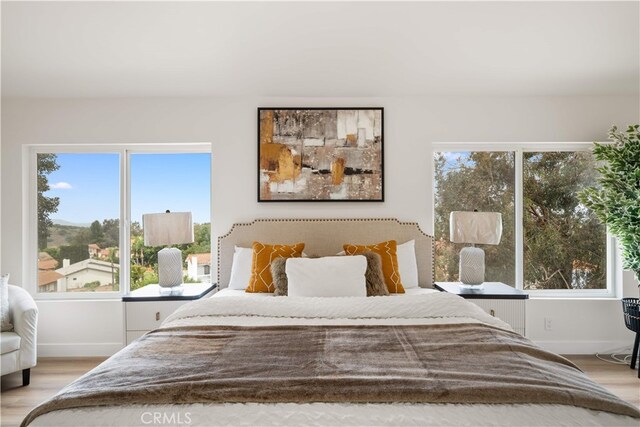 17585 Candela Dr, Rowland Heights, CA 91748 - bedroom with baseboards and wood finished floors