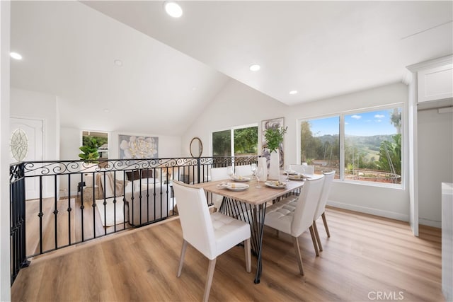 17585 Candela Dr, Rowland Heights, CA 91748 - dining space featuring light wood-style floors, lofted ceiling, recessed lighting, and baseboards