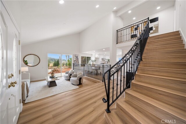 17585 Candela Dr, Rowland Heights, CA 91748 - entrance foyer with wood finished floors, recessed lighting, high vaulted ceiling, stairway, and baseboards