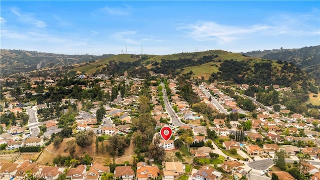 17585 Candela Dr, Rowland Heights, CA 91748 - aerial overview of property's location featuring a mountainous background and nearby suburban area