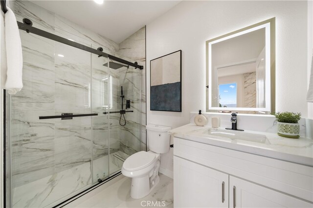 17585 Candela Dr, Rowland Heights, CA 91748 - bathroom featuring toilet, marble look tile flooring, vanity, a marble finish shower, and baseboards
