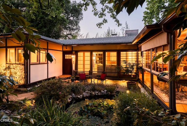 1364 N Harding Ave, Pasadena, CA 91104 - rear view of house featuring a small pond and roof with shingles