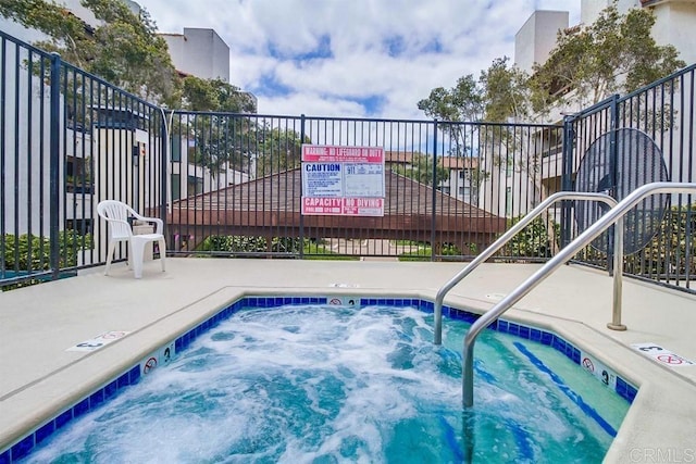 5605 Friars Rd Unit 323, San Diego, CA 92110 - view of swimming pool featuring a community hot tub