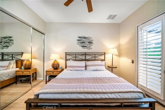 79980 Merion Ln, Quinta, CA 92253 - bedroom with light wood finished floors, a closet, a ceiling fan, and baseboards