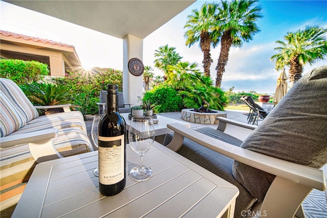 79980 Merion Ln, Quinta, CA 92253 - view of patio / terrace featuring outdoor dining space and an outdoor living space with a fire pit