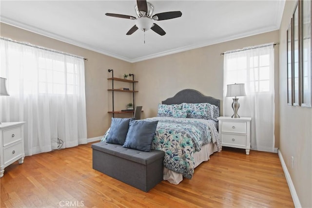 14906 Grevillea Ave, Lawndale, CA 90260 - bedroom with multiple windows, light wood-style floors, crown molding, and baseboards