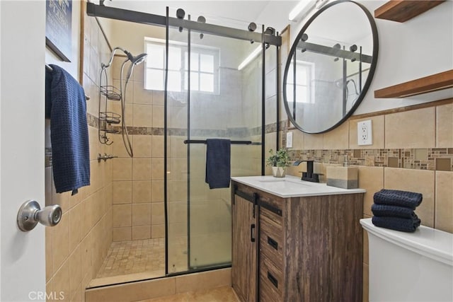 14906 Grevillea Ave, Lawndale, CA 90260 - full bath featuring vanity, a shower stall, toilet, and tile walls