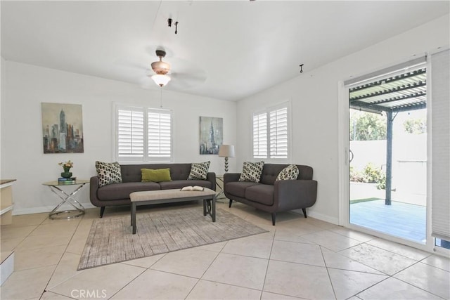 14906 Grevillea Ave, Lawndale, CA 90260 - living room with plenty of natural light, a ceiling fan, and baseboards