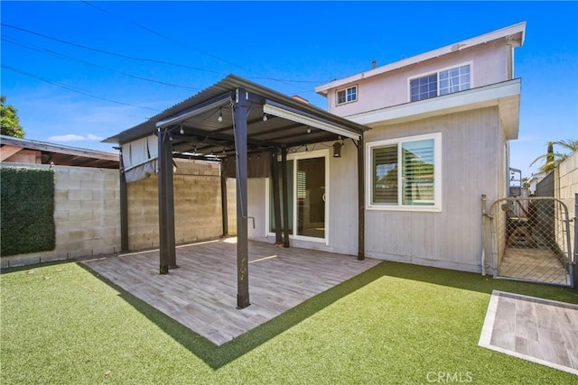 14906 Grevillea Ave, Lawndale, CA 90260 - rear view of property featuring a gate, a patio, and a gazebo