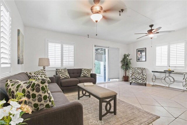 14906 Grevillea Ave, Lawndale, CA 90260 - living room with a ceiling fan, plenty of natural light, and light tile patterned flooring