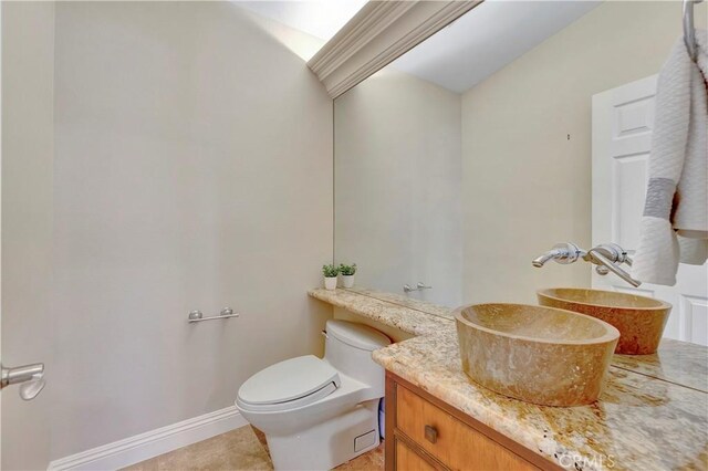 1806 Lake St, Huntington Beach, CA 92648 - bathroom with toilet, vanity, and baseboards