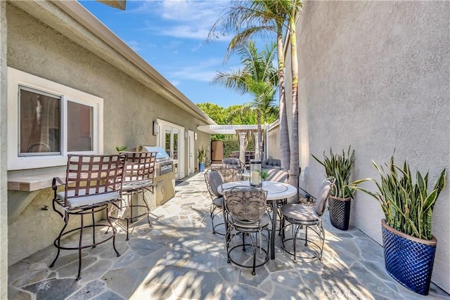 1806 Lake St, Huntington Beach, CA 92648 - view of patio featuring outdoor dining space and an outdoor kitchen