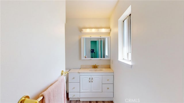 8776 Holly St, Rancho Cucamonga, CA 91701 - bathroom featuring vanity and wood finished floors