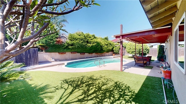 8776 Holly St, Rancho Cucamonga, CA 91701 - view of swimming pool featuring a patio and a fenced backyard