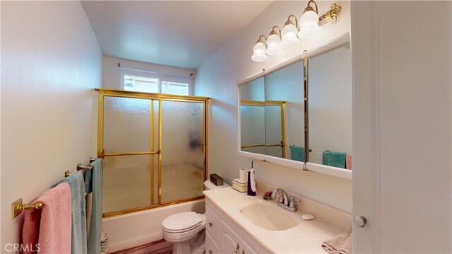 8776 Holly St, Rancho Cucamonga, CA 91701 - bathroom featuring vanity, toilet, and shower / bath combination with glass door
