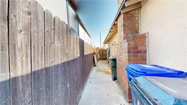 8776 Holly St, Rancho Cucamonga, CA 91701 - view of side of home featuring stucco siding