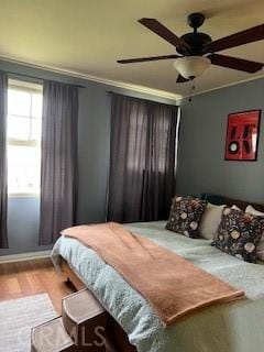 2415 Cabrillo Ave, Torrance, CA 90501 - bedroom with ornamental molding, wood finished floors, and a ceiling fan