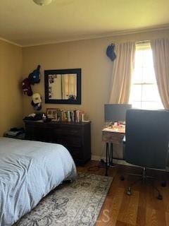 2415 Cabrillo Ave, Torrance, CA 90501 - bedroom featuring crown molding, wood finished floors, and a desk