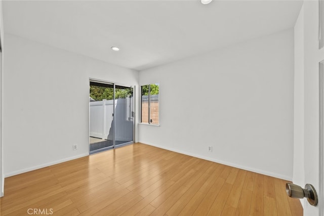 6031 Beck Ave, North Hollywood, CA 91606 - spare room with baseboards, wood finished floors, and recessed lighting