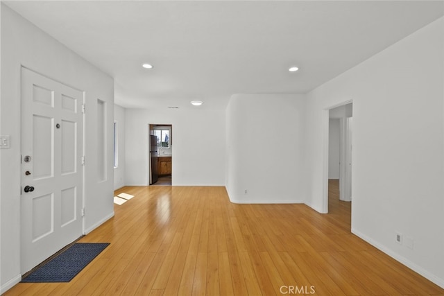 6031 Beck Ave, North Hollywood, CA 91606 - spare room featuring baseboards, light wood-style floors, and recessed lighting