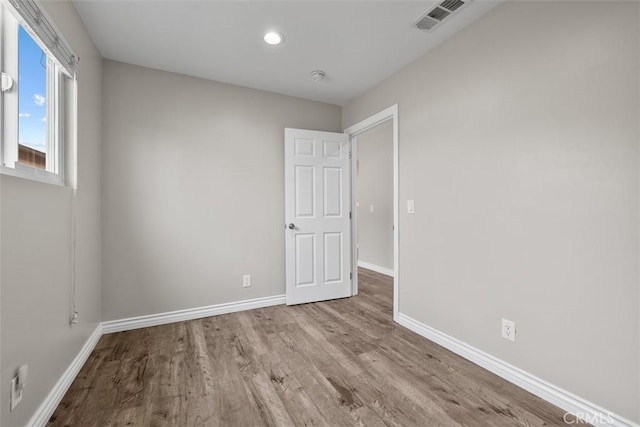 13339 Bonanza St, Arleta, CA 91331 - empty room with wood finished floors, baseboards, and recessed lighting