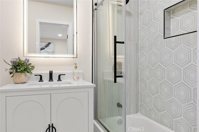 11091 Ranger Dr, Los Alamitos, CA 90720 - full bathroom featuring vanity and shower / bath combination with glass door