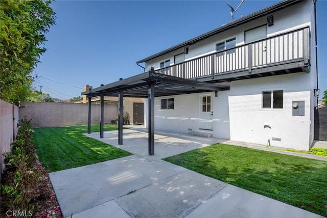 11091 Ranger Dr, Los Alamitos, CA 90720 - rear view of property with a balcony, a patio, stucco siding, and crawl space